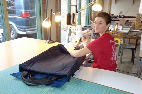 Emily sewing padded harp cases